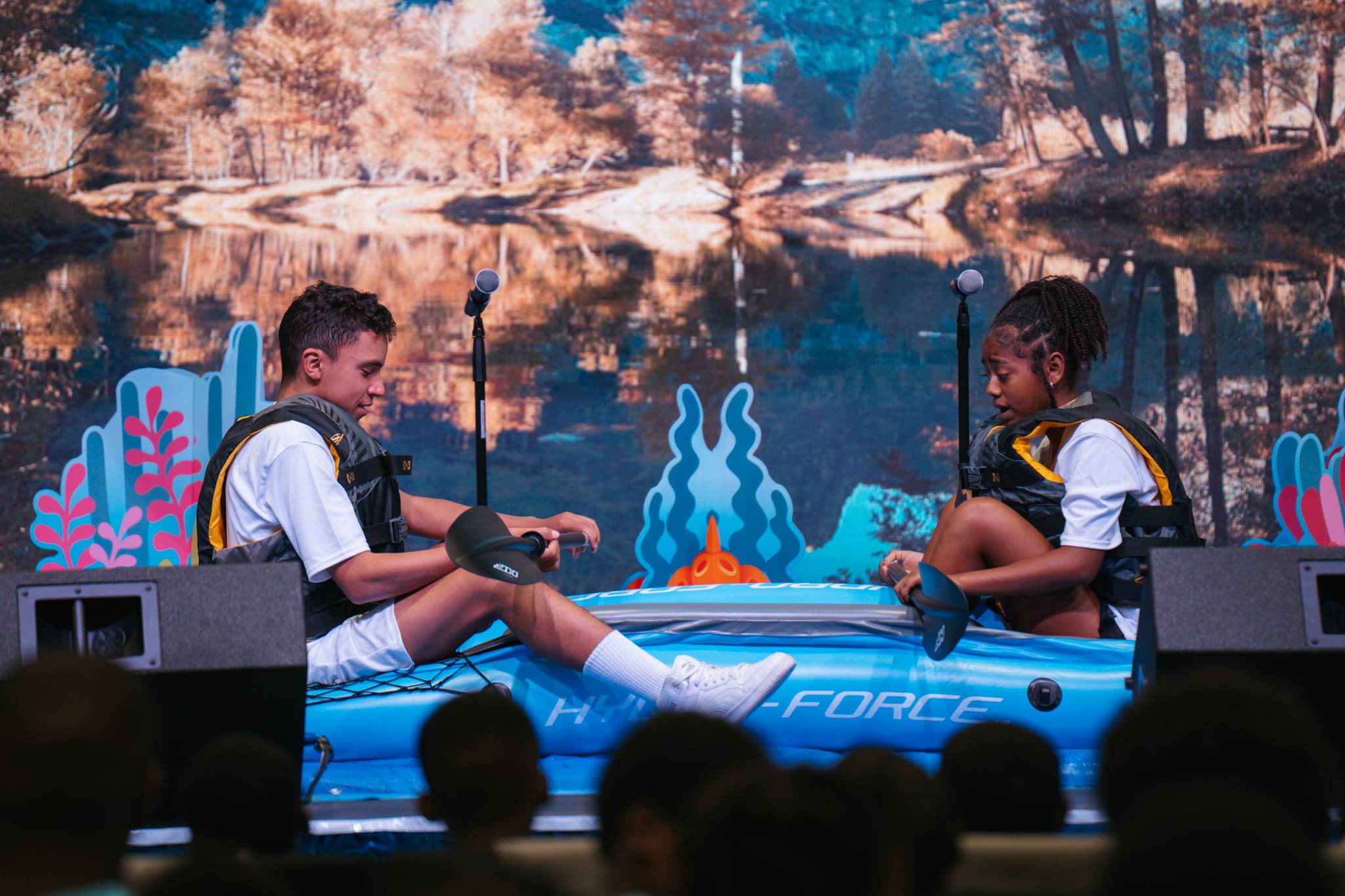 Theatre skit with inflatable boat at Love First summer camp