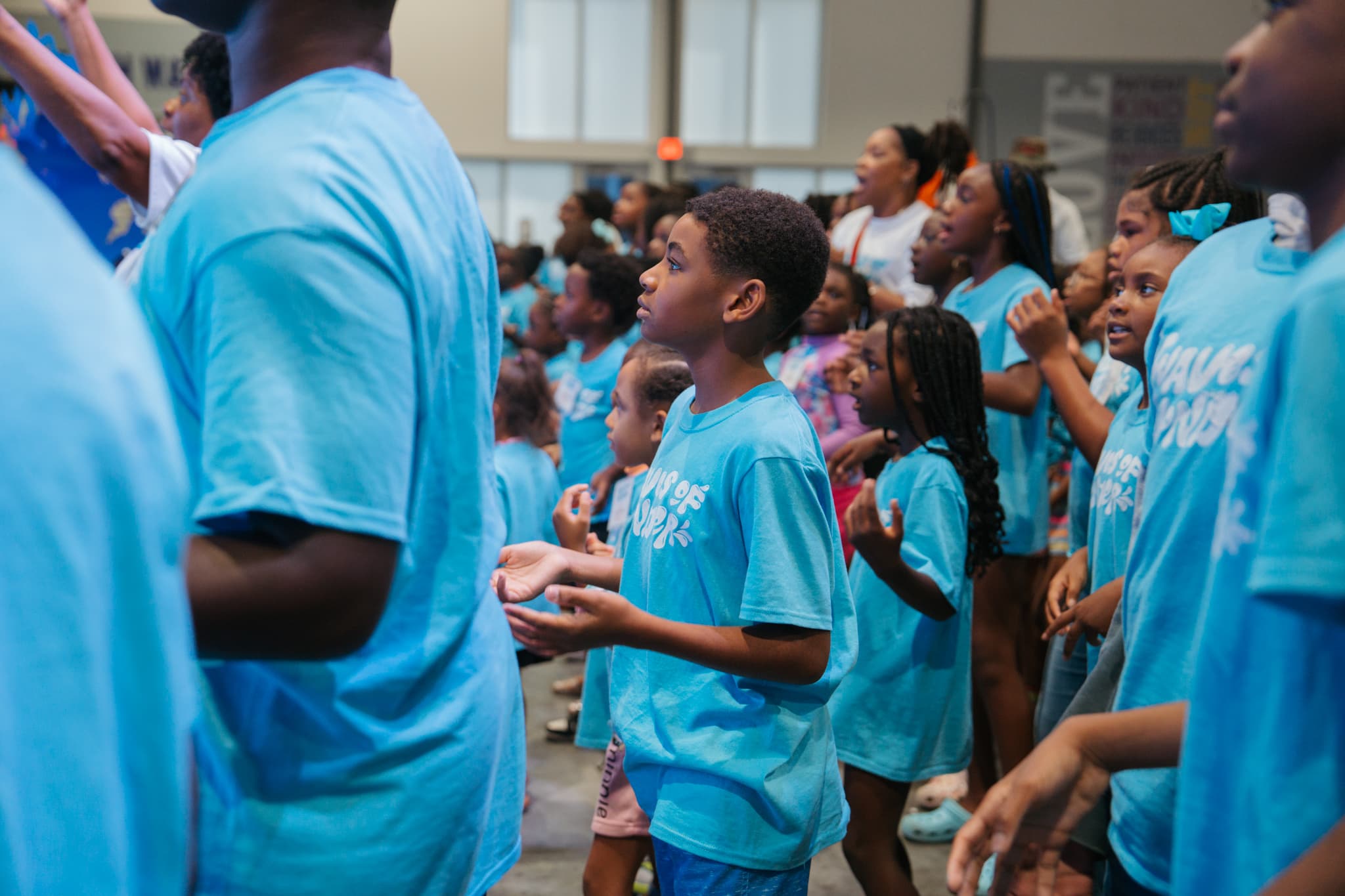 Kids worshipping together at LFCC summer camp